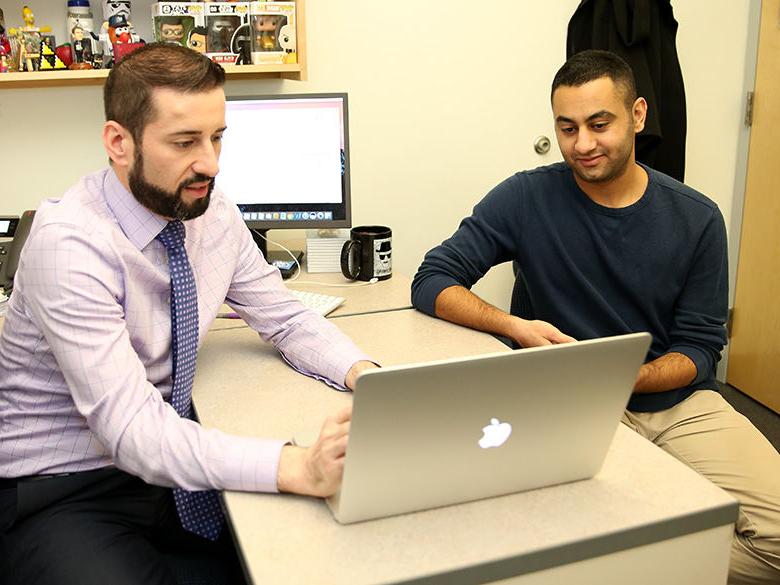 Brandywine student meeting with faculty adviser